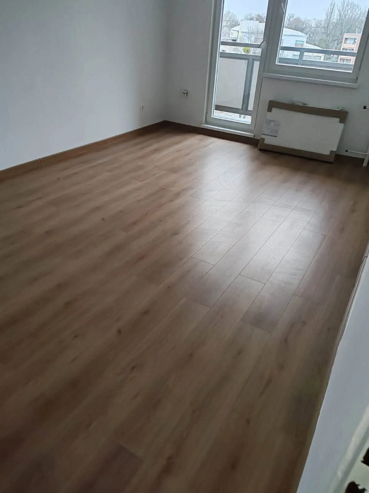 Nová laminátová podlaha